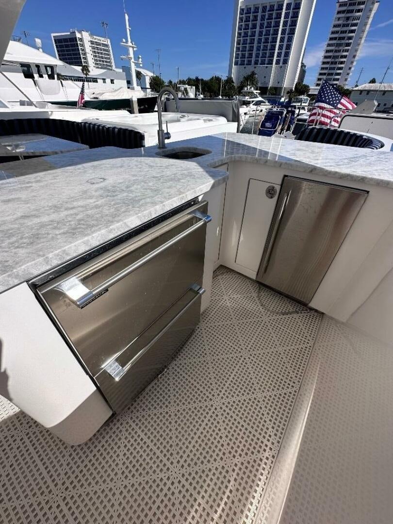 a kitchen with a grill aboard LADY B Yacht for Sale