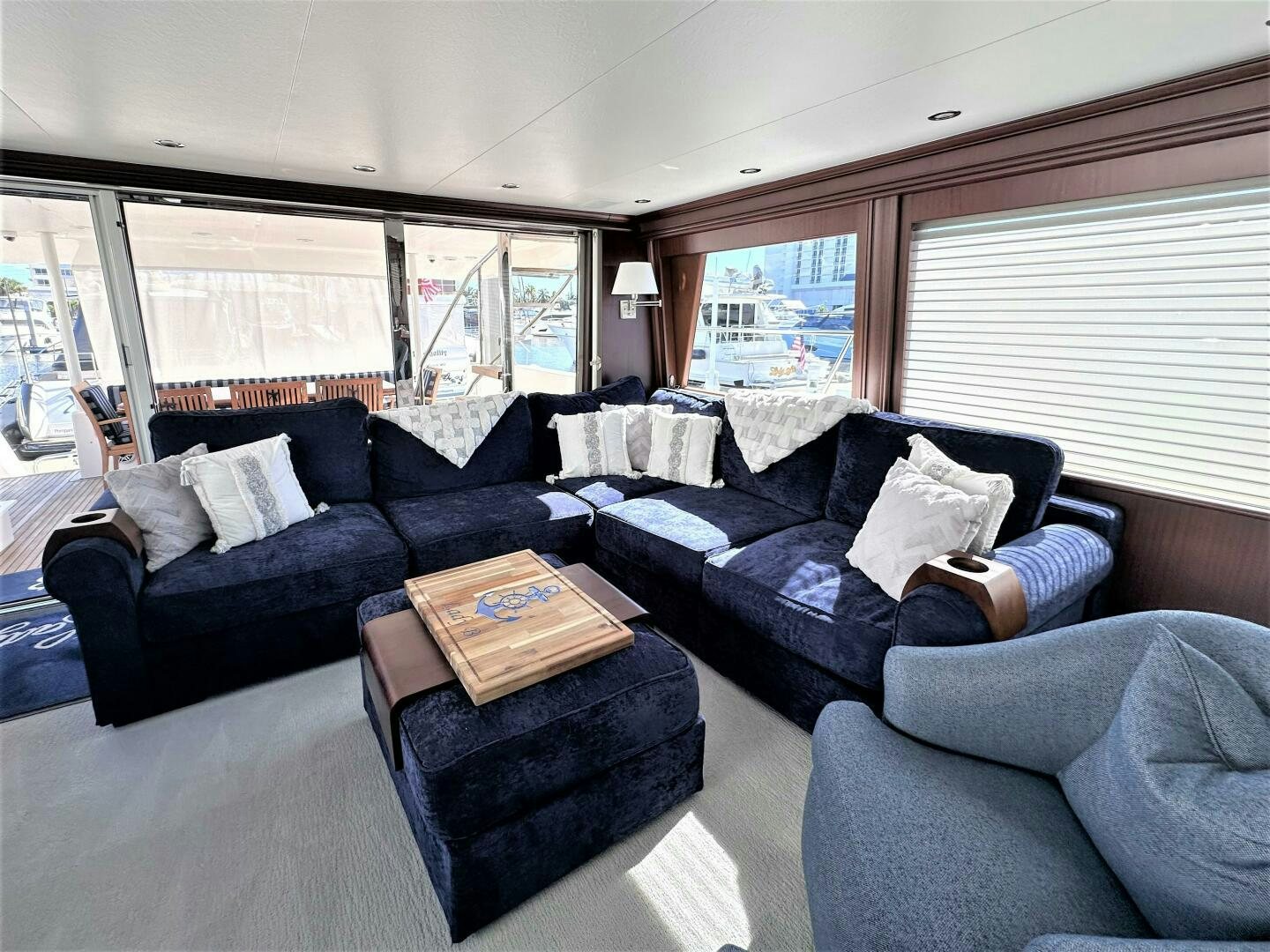 a living room with a couch and a coffee table aboard LADY B Yacht for Sale
