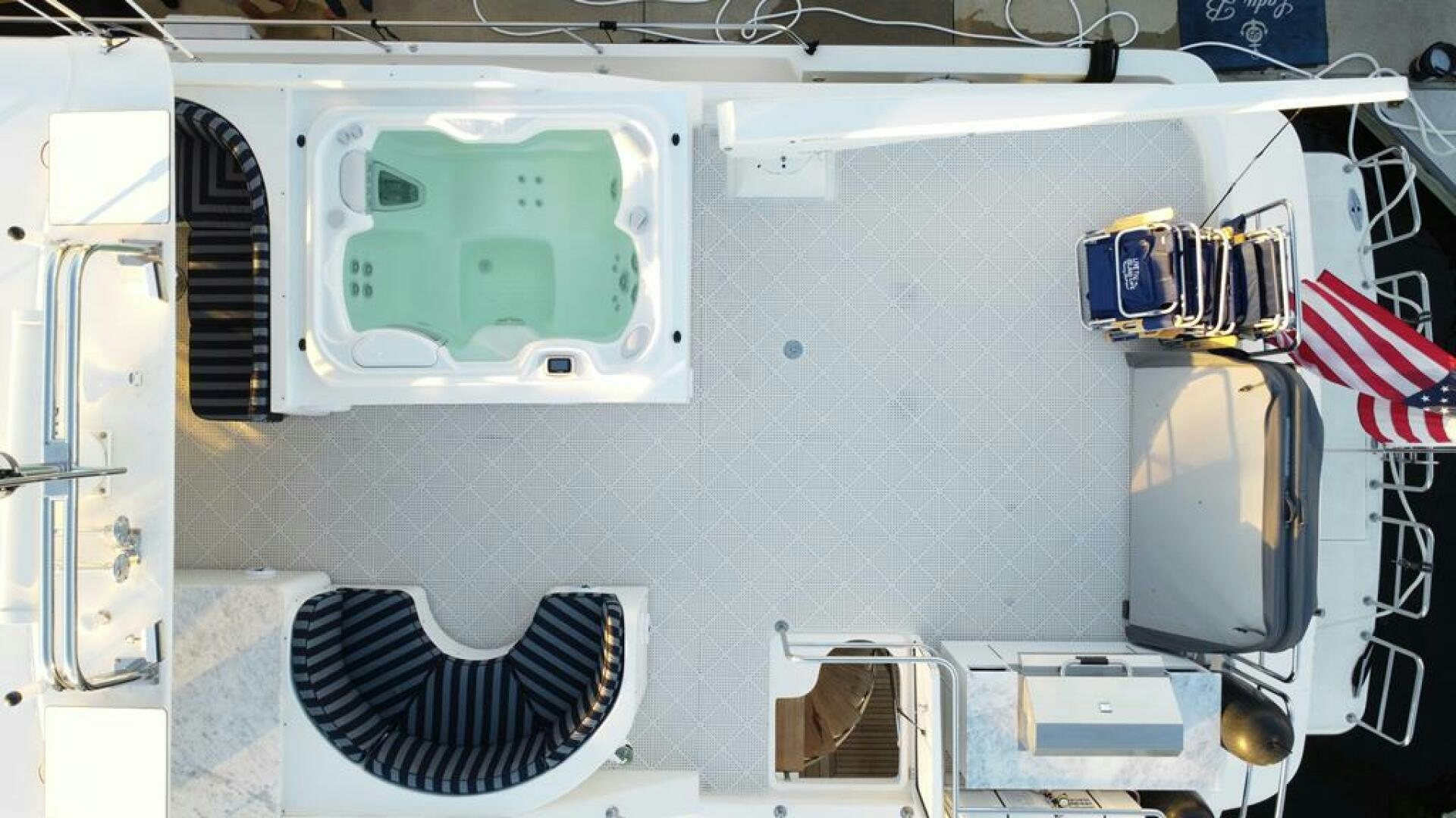 a large white vehicle with a flag on the side aboard LADY B Yacht for Sale