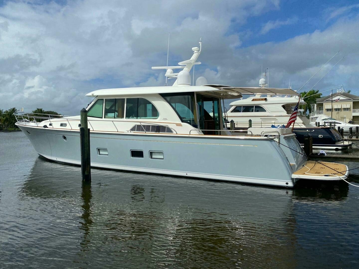 a boat docked in a harbor aboard WHIRL AWAY Yacht for Sale