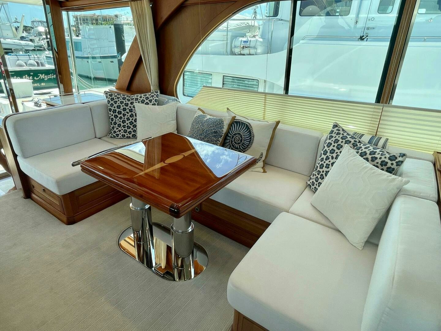 a living room with a couch and a coffee table aboard WHIRL AWAY Yacht for Sale