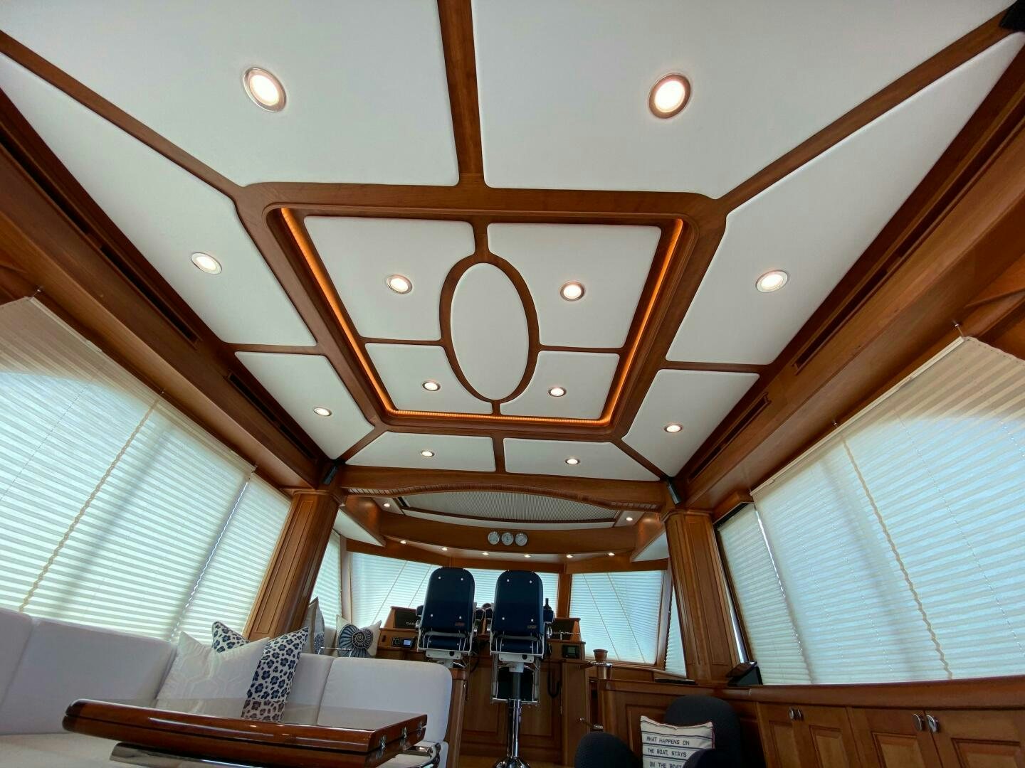 a room with a fan and chairs aboard WHIRL AWAY Yacht for Sale