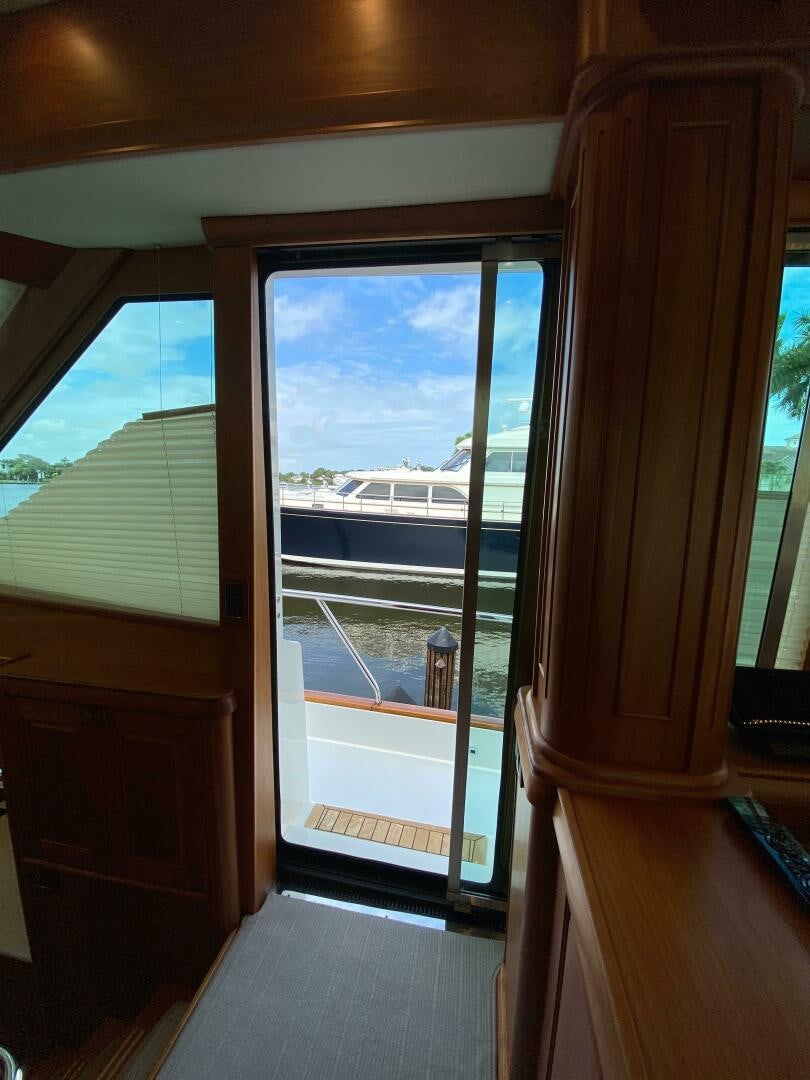 a room with a door open aboard WHIRL AWAY Yacht for Sale