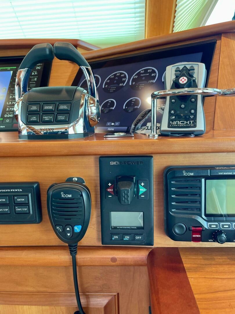 a group of telephones on a table aboard WHIRL AWAY Yacht for Sale