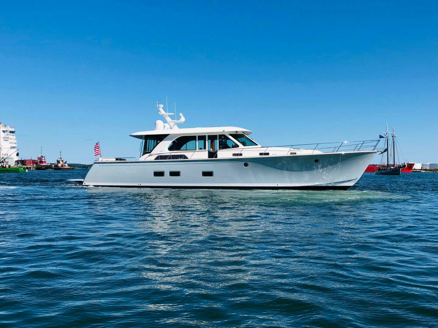 a white yacht in the water aboard WHIRL AWAY Yacht for Sale