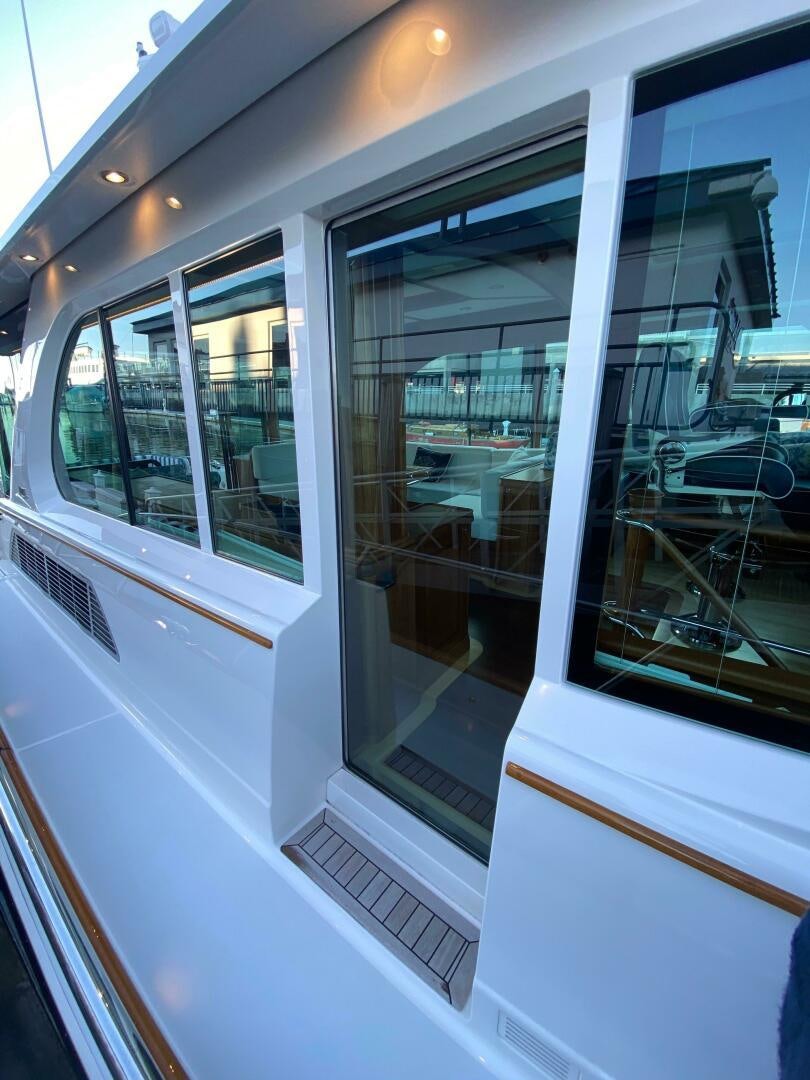 a large glass window aboard WHIRL AWAY Yacht for Sale