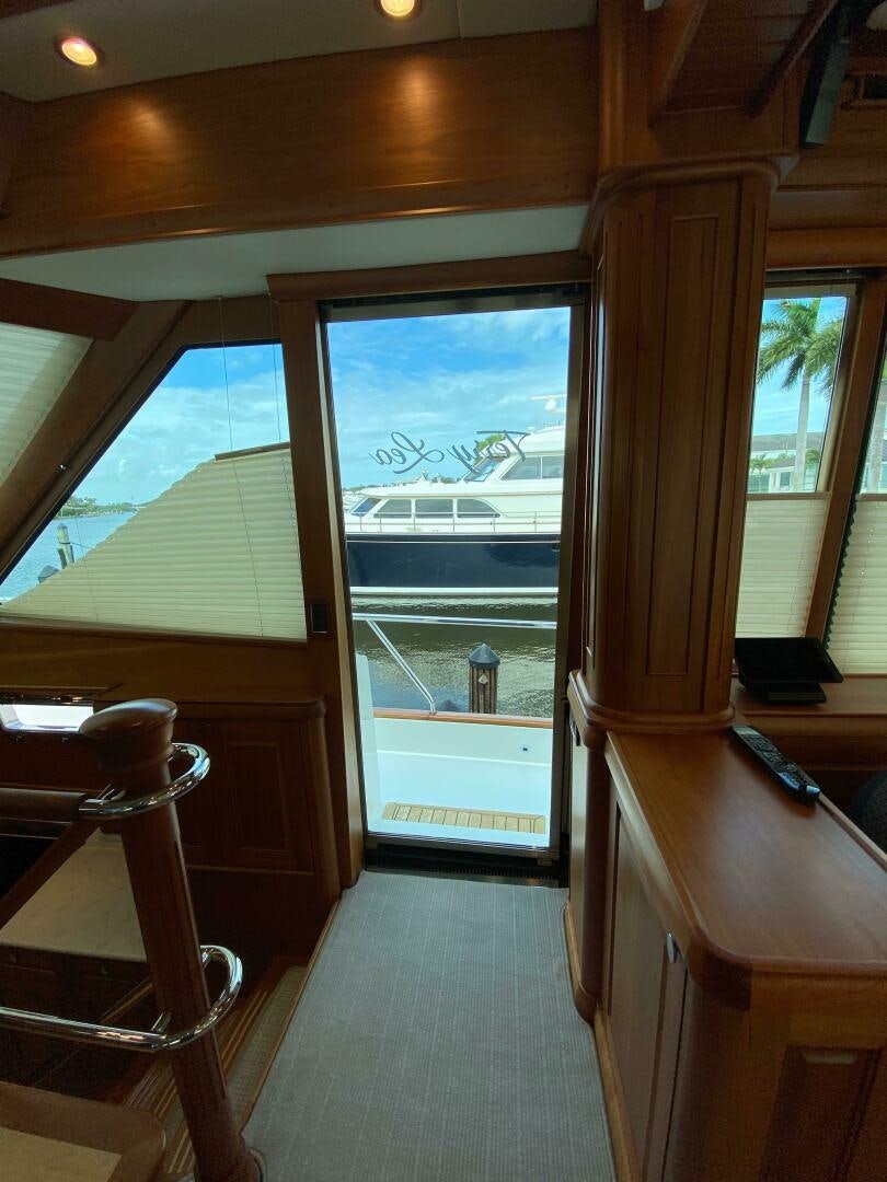 a room with a view of the water and the land below aboard WHIRL AWAY Yacht for Sale