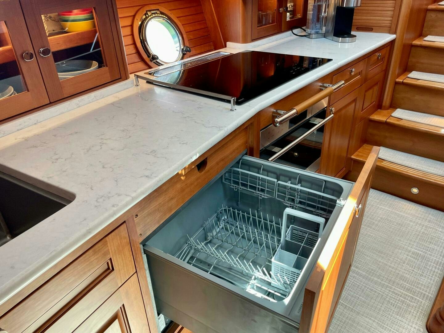 a kitchen with a large stainless steel sink aboard WHIRL AWAY Yacht for Sale