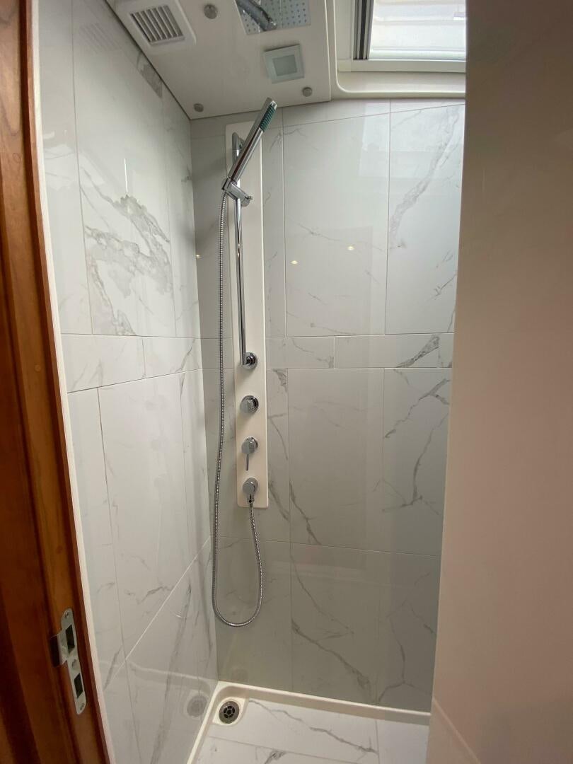a shower unit in a bathroom aboard WHIRL AWAY Yacht for Sale