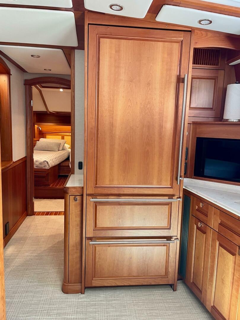 a wooden cabinet in a room aboard WHIRL AWAY Yacht for Sale