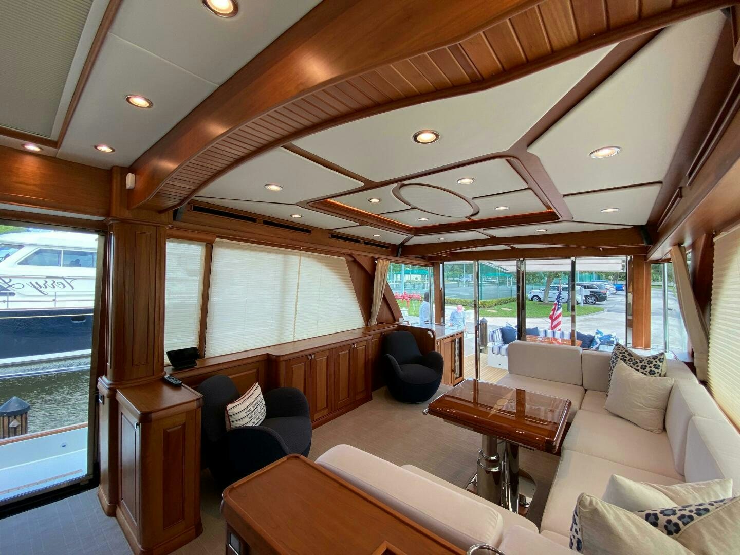 a living room with a large window aboard WHIRL AWAY Yacht for Sale