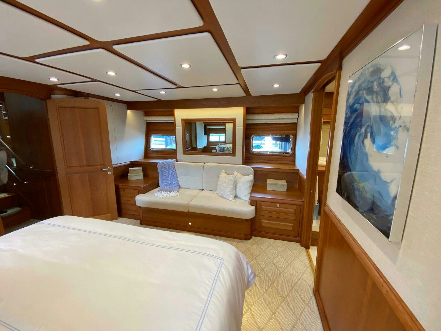 a room with a bed and a television aboard WHIRL AWAY Yacht for Sale
