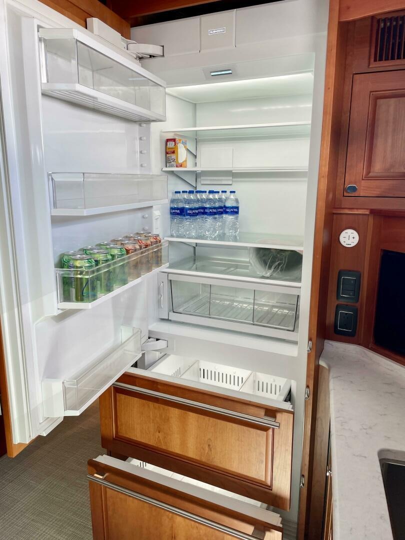 a refrigerator with its door open aboard WHIRL AWAY Yacht for Sale