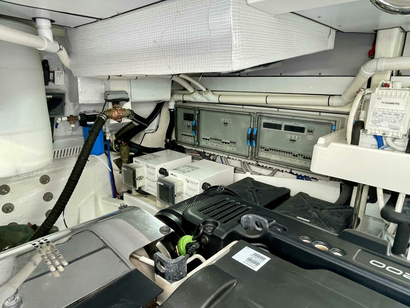 a person working on a machine aboard WHIRL AWAY Yacht for Sale