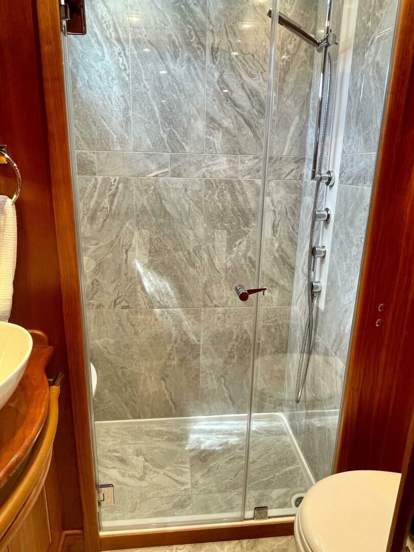 a shower with glass doors aboard WHIRL AWAY Yacht for Sale