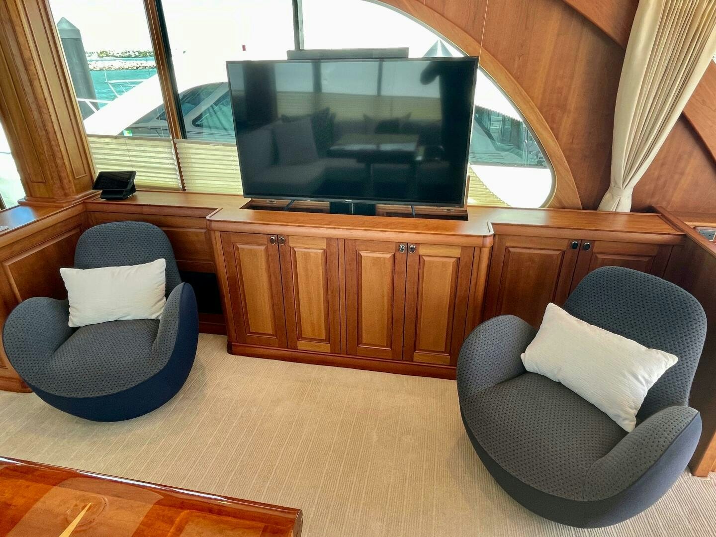 a room with a couch and a television aboard WHIRL AWAY Yacht for Sale