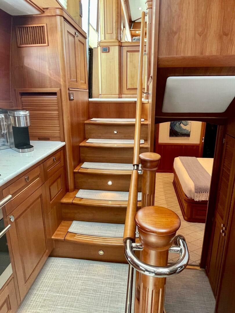 a wooden staircase in a kitchen aboard WHIRL AWAY Yacht for Sale