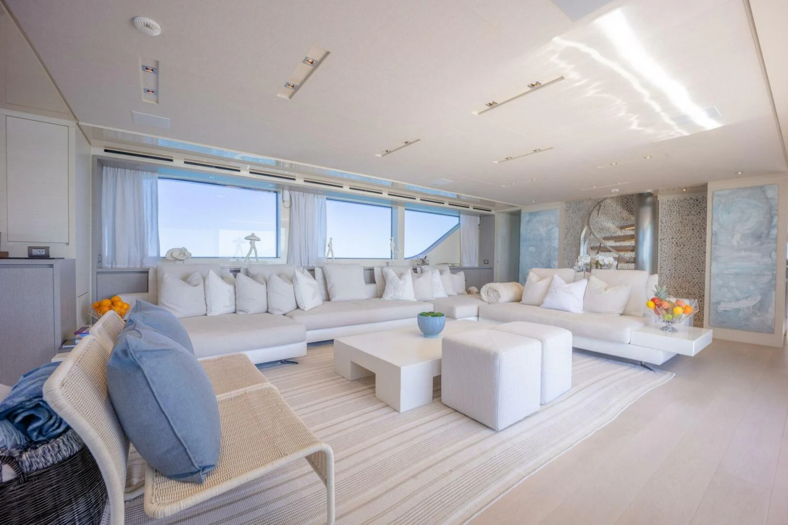 a living room with a large window aboard PHOENIX Yacht for Sale