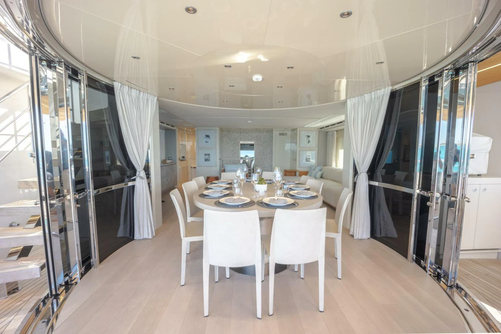 a dining room with a table aboard PHOENIX Yacht for Sale
