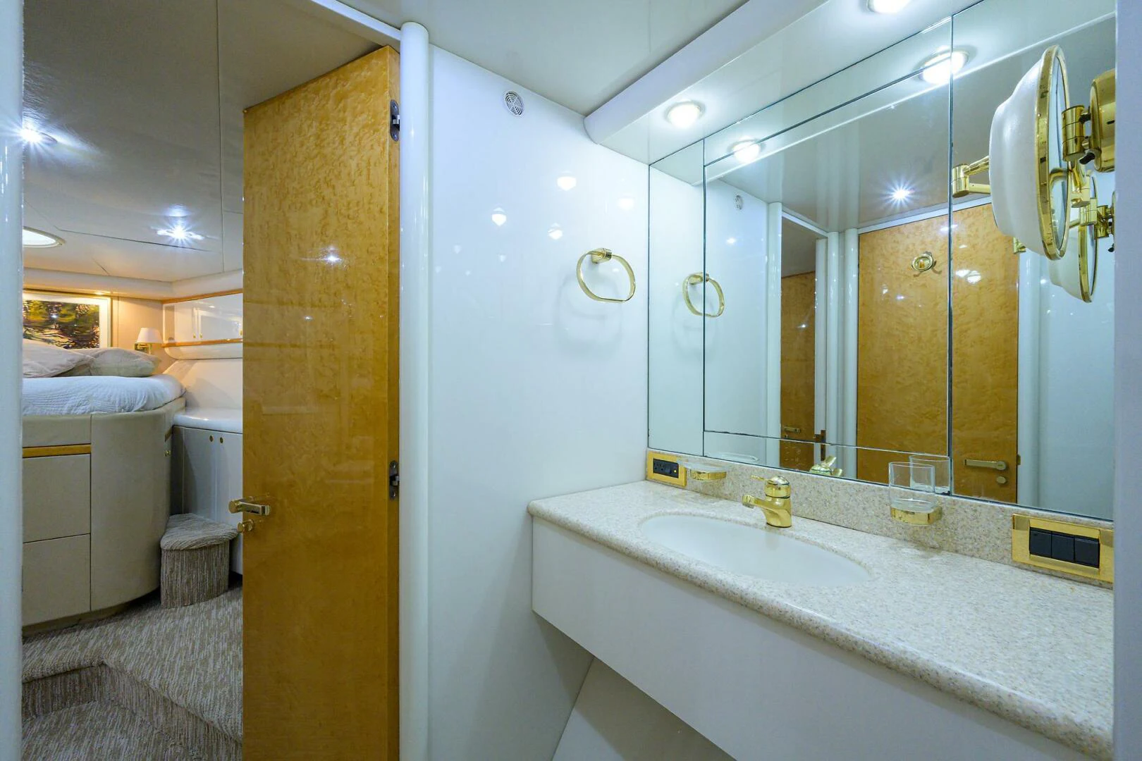 a bathroom with a large mirror aboard LOST TEXAN Yacht for Sale