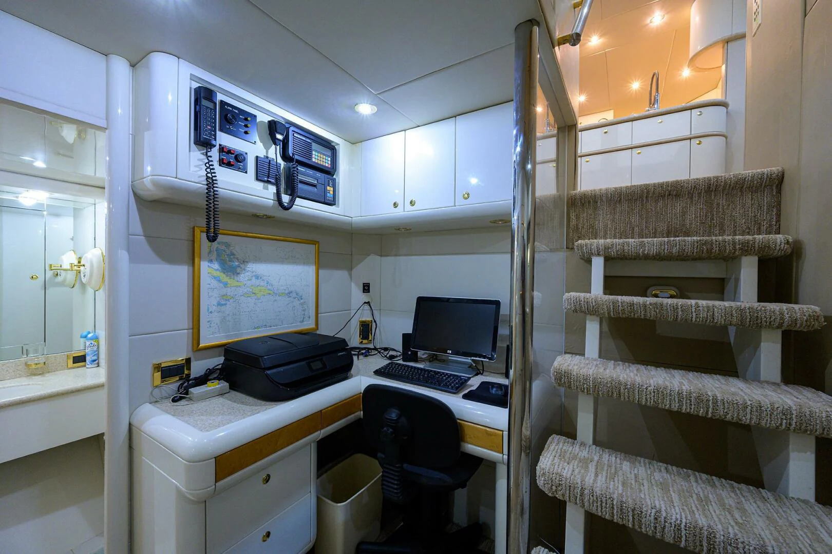 a room with a desk and a computer aboard LOST TEXAN Yacht for Sale