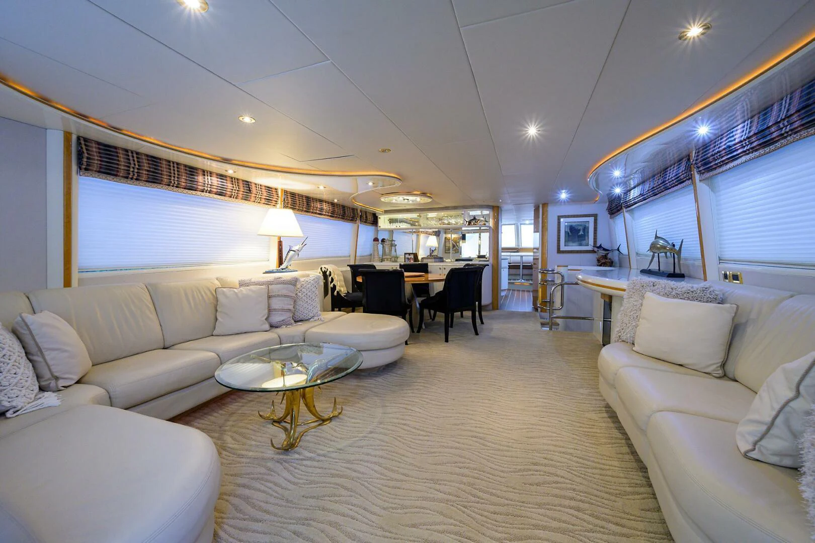 a living room with a large window aboard LOST TEXAN Yacht for Sale