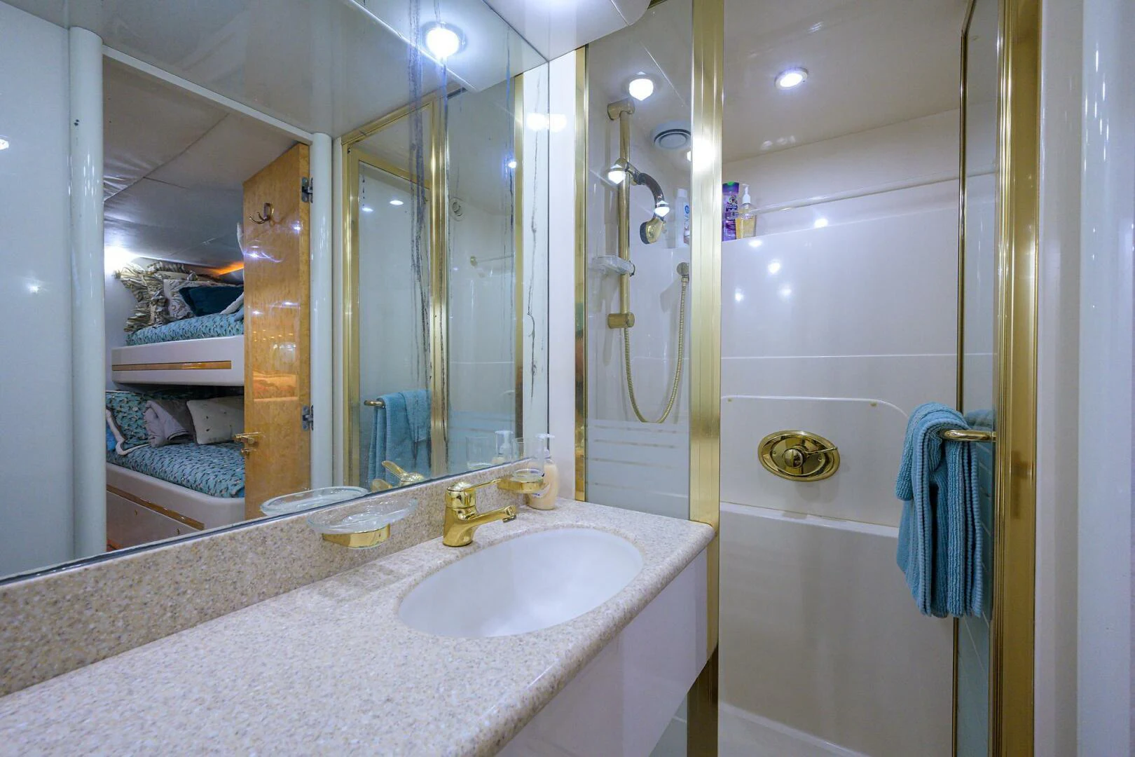 a bathroom with a large mirror aboard LOST TEXAN Yacht for Sale