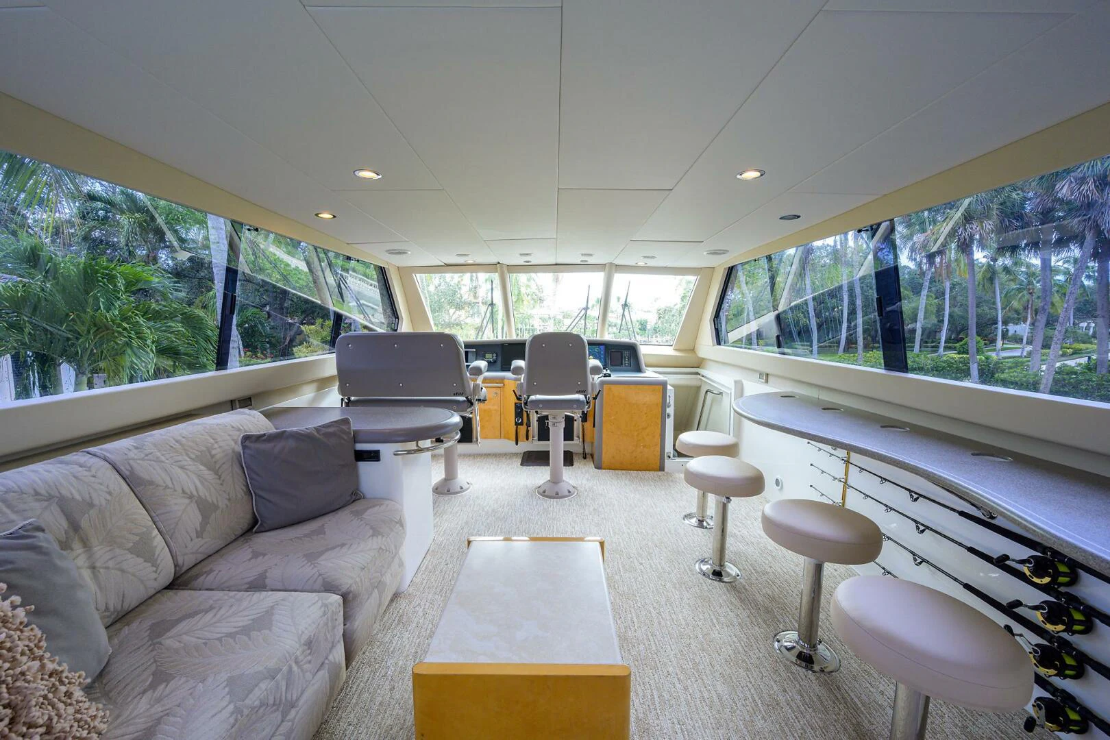 a living room with a large window aboard LOST TEXAN Yacht for Sale