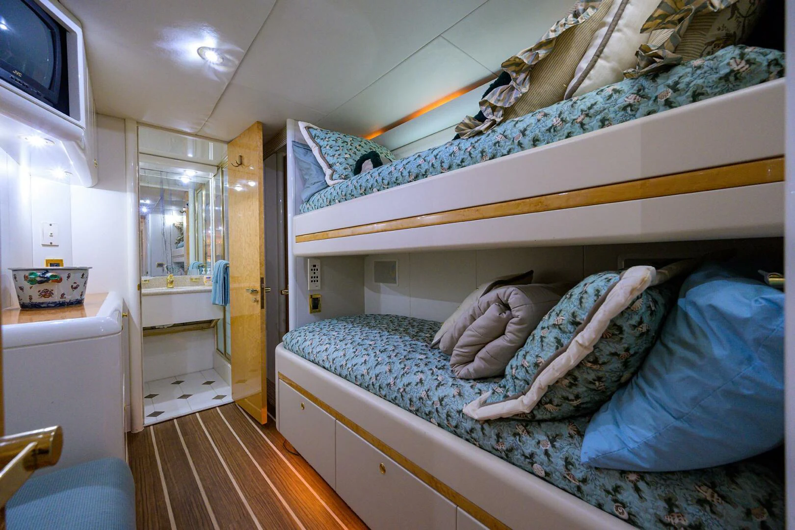 a person lying in a bed aboard LOST TEXAN Yacht for Sale