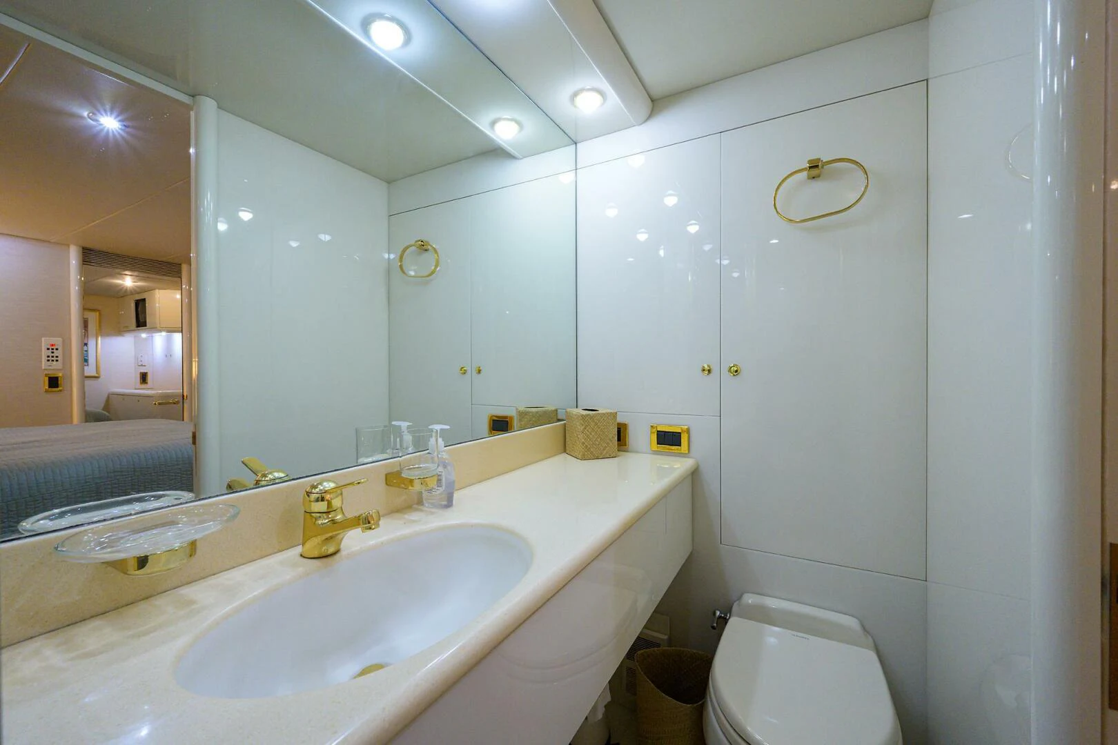 a bathroom with a sink and a toilet aboard LOST TEXAN Yacht for Sale