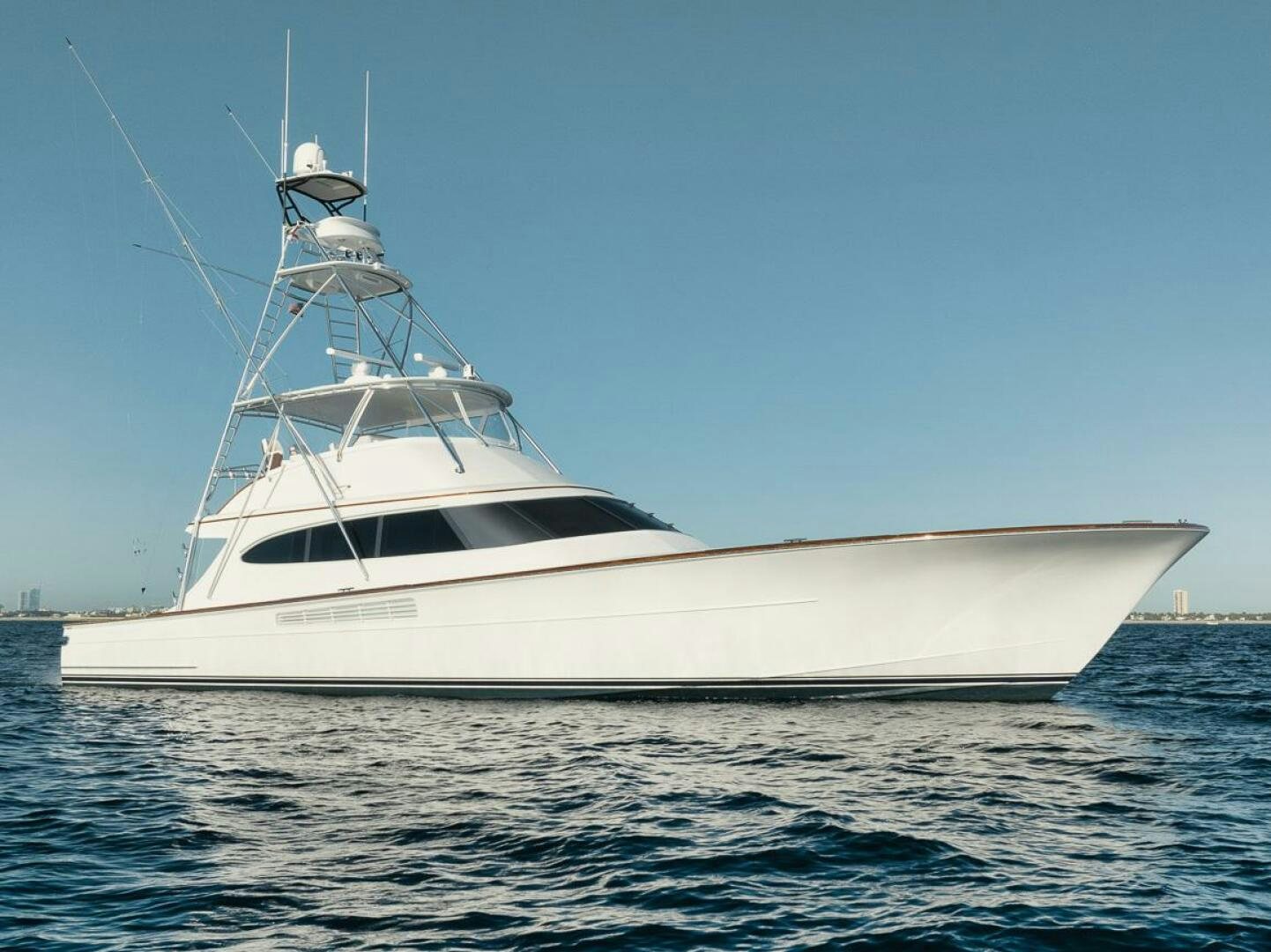 a white yacht in the water aboard HULLBILLY Yacht for Sale