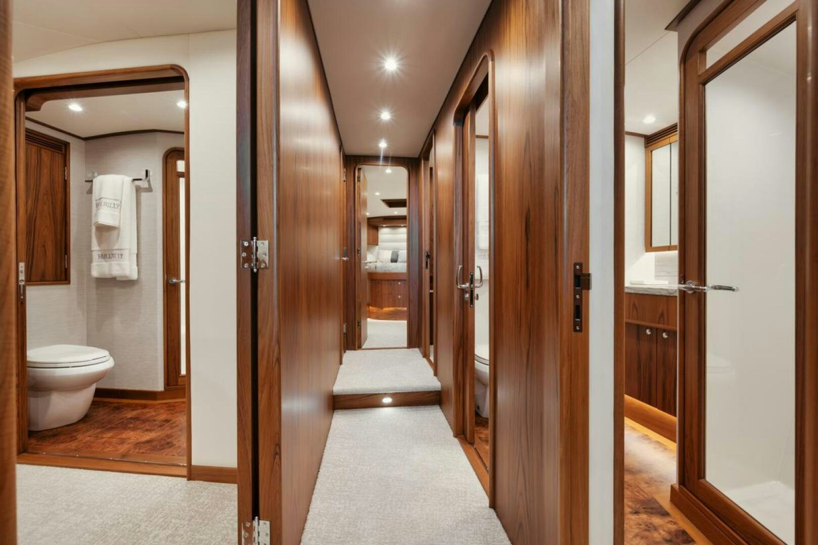 a bathroom with a large mirror aboard HULLBILLY Yacht for Sale