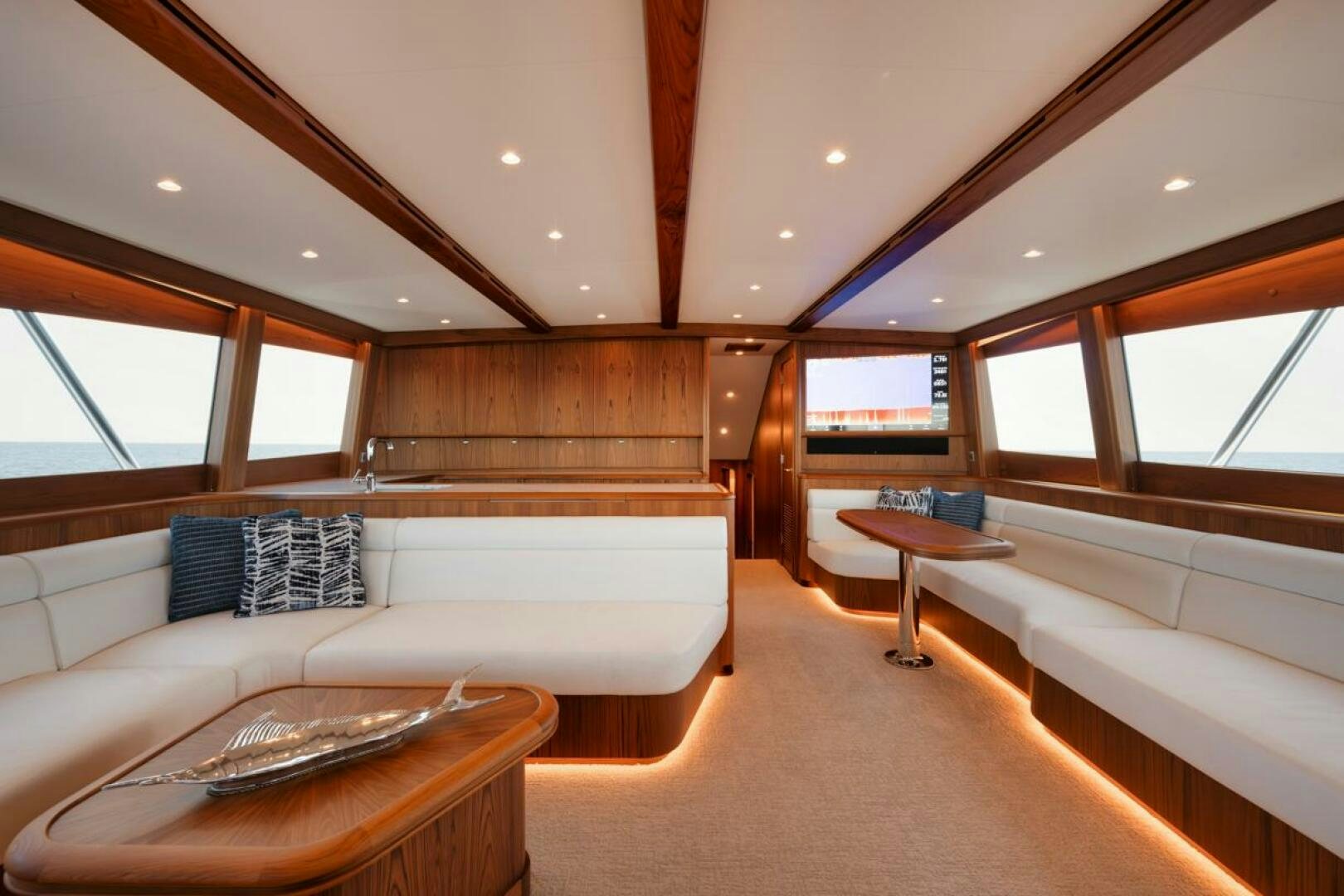 a room with a bed and a table aboard HULLBILLY Yacht for Sale