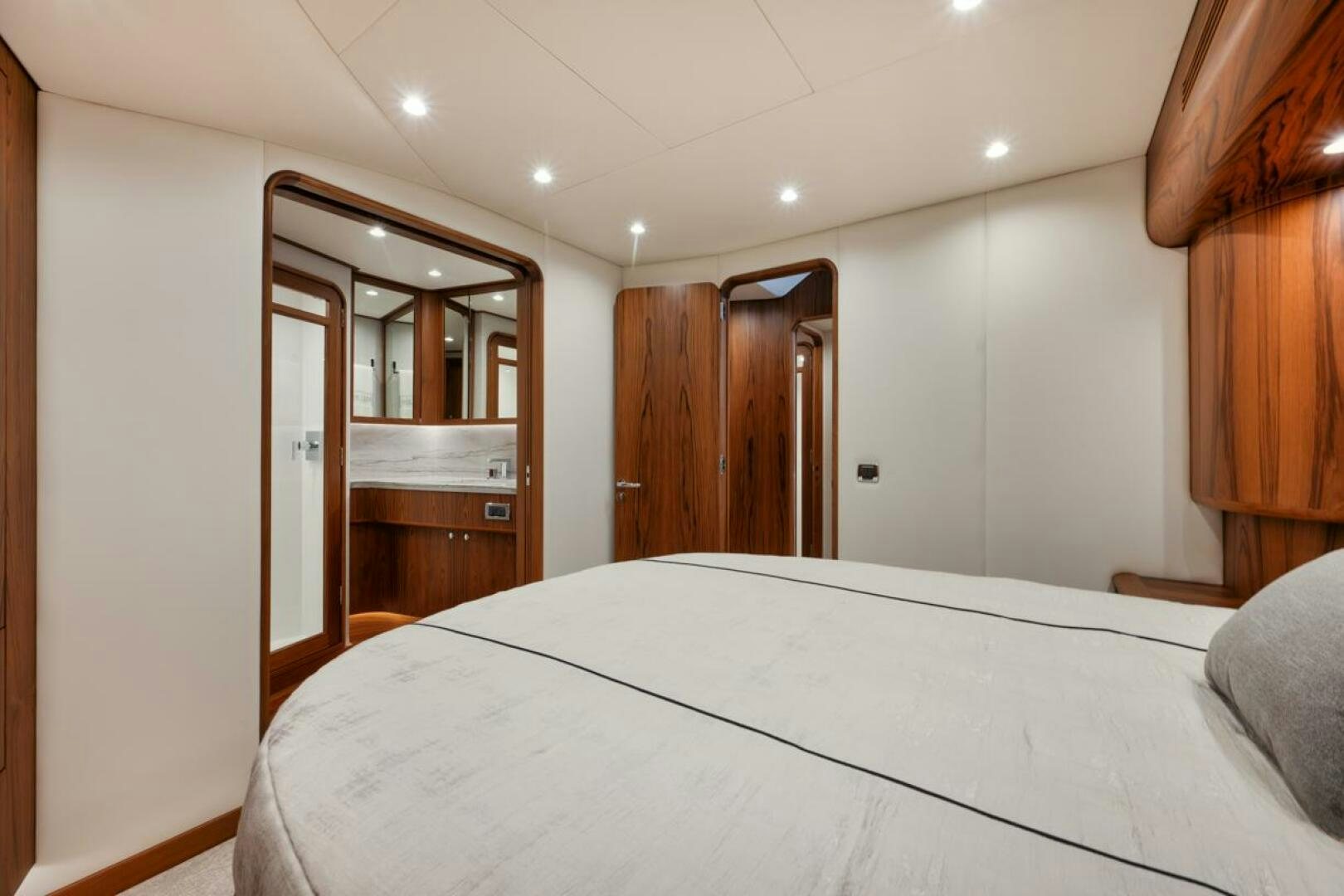 a bedroom with a large bed aboard HULLBILLY Yacht for Sale