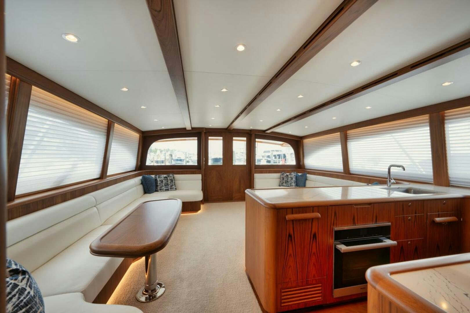 a room with a bed and a desk aboard HULLBILLY Yacht for Sale