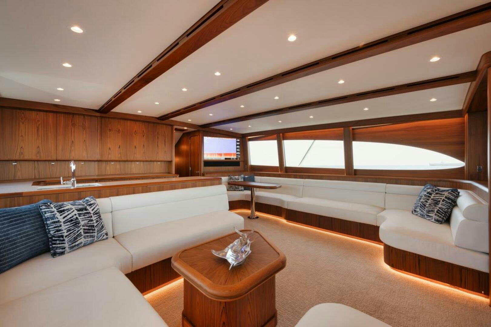 a room with a couch and a table aboard HULLBILLY Yacht for Sale