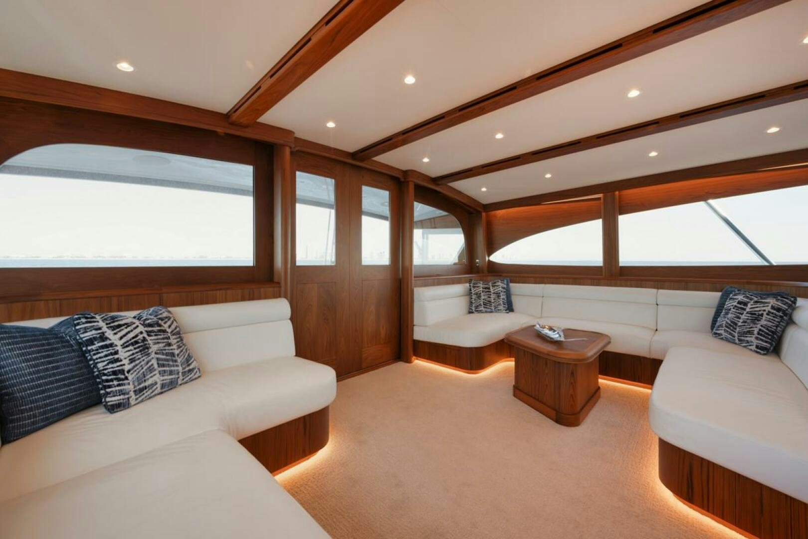 a large living room with a large window aboard HULLBILLY Yacht for Sale