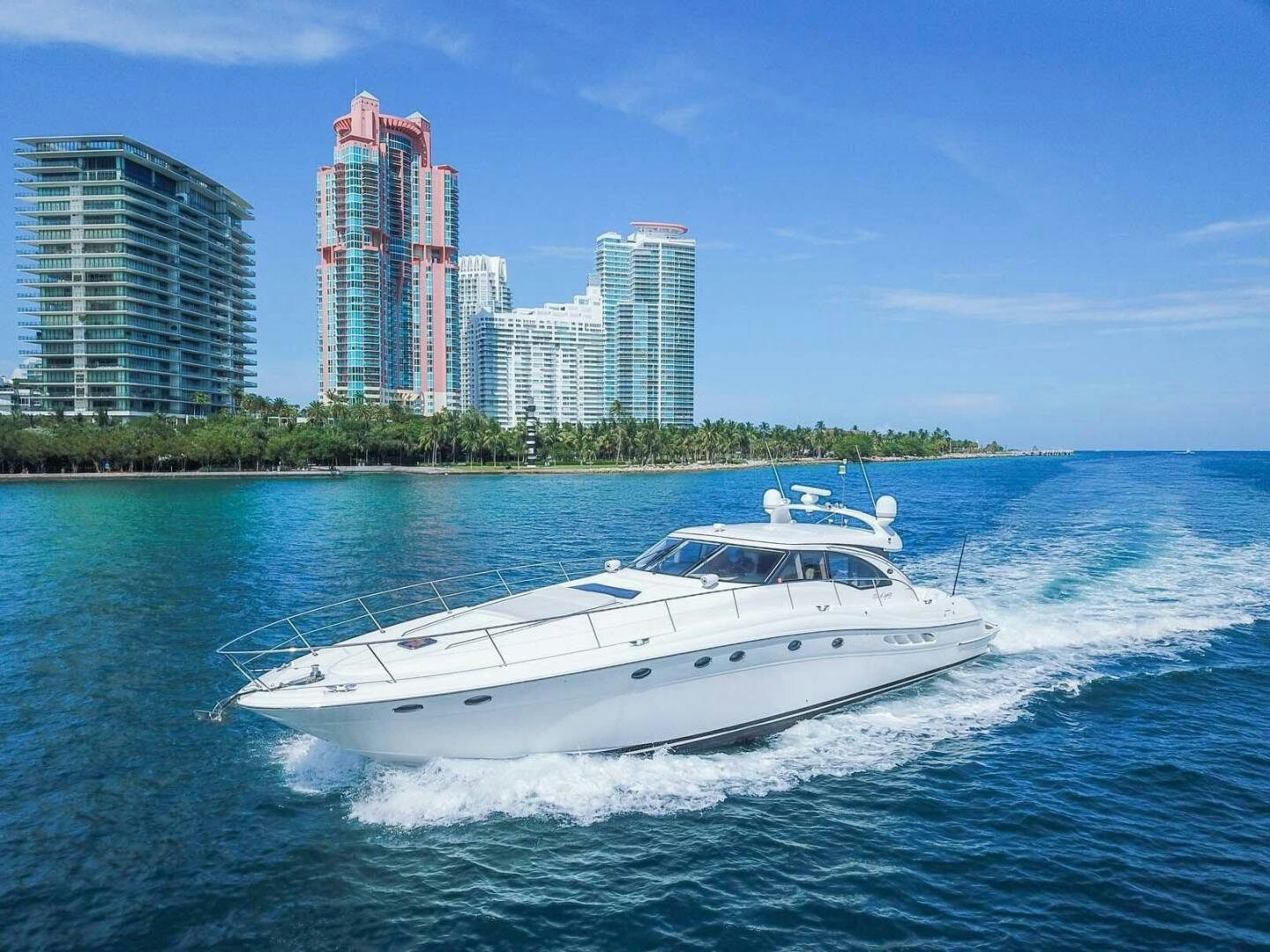 a white yacht on the water aboard FAIRYTALE Yacht for Sale