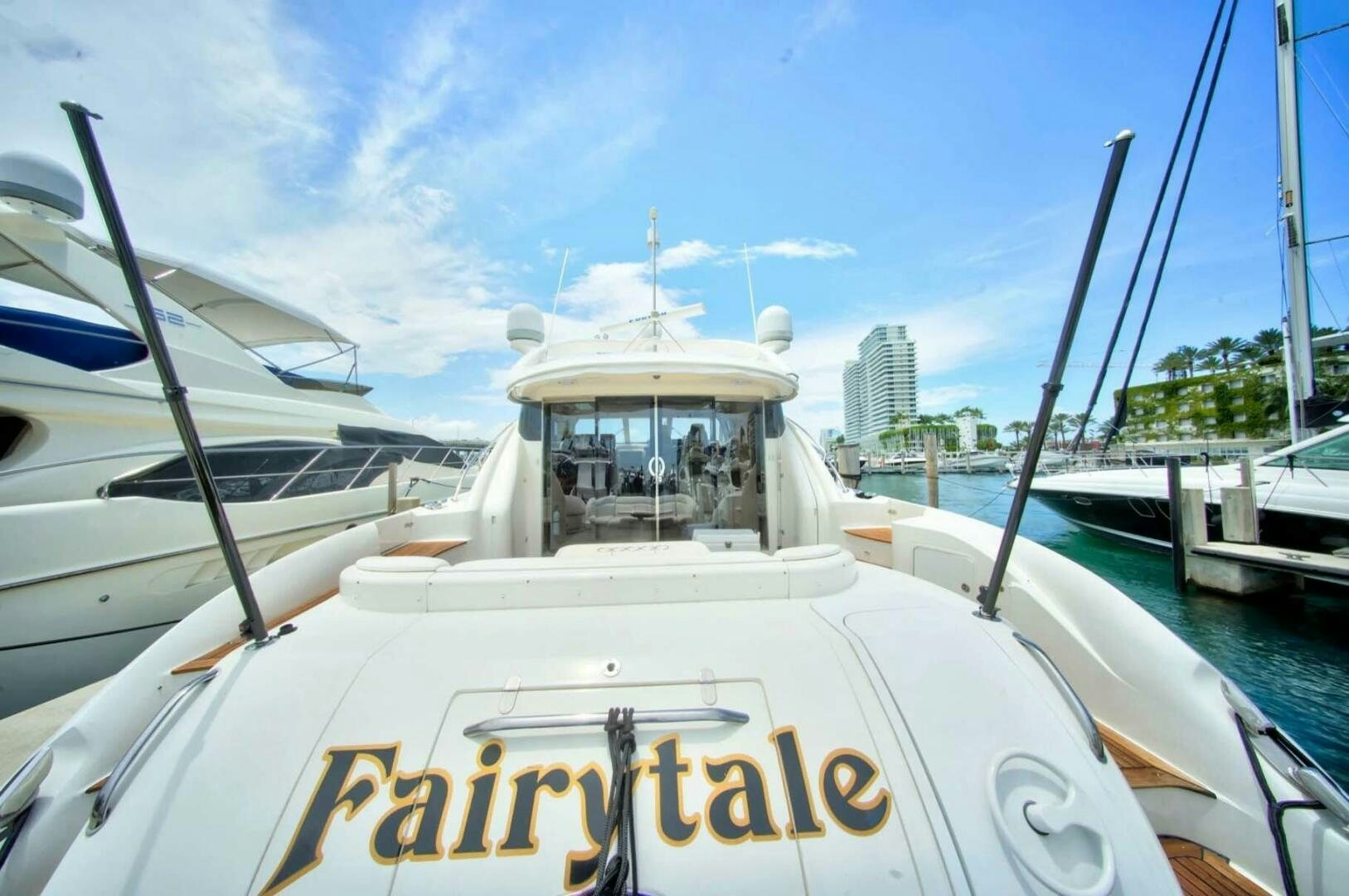a boat with a sign on the front aboard FAIRYTALE Yacht for Sale
