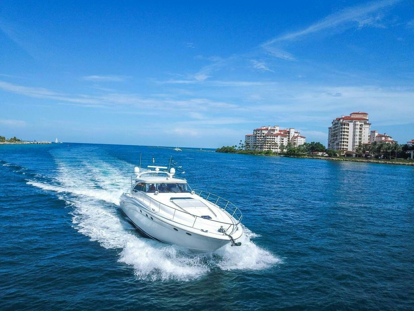 a white boat on the water aboard FAIRYTALE Yacht for Sale