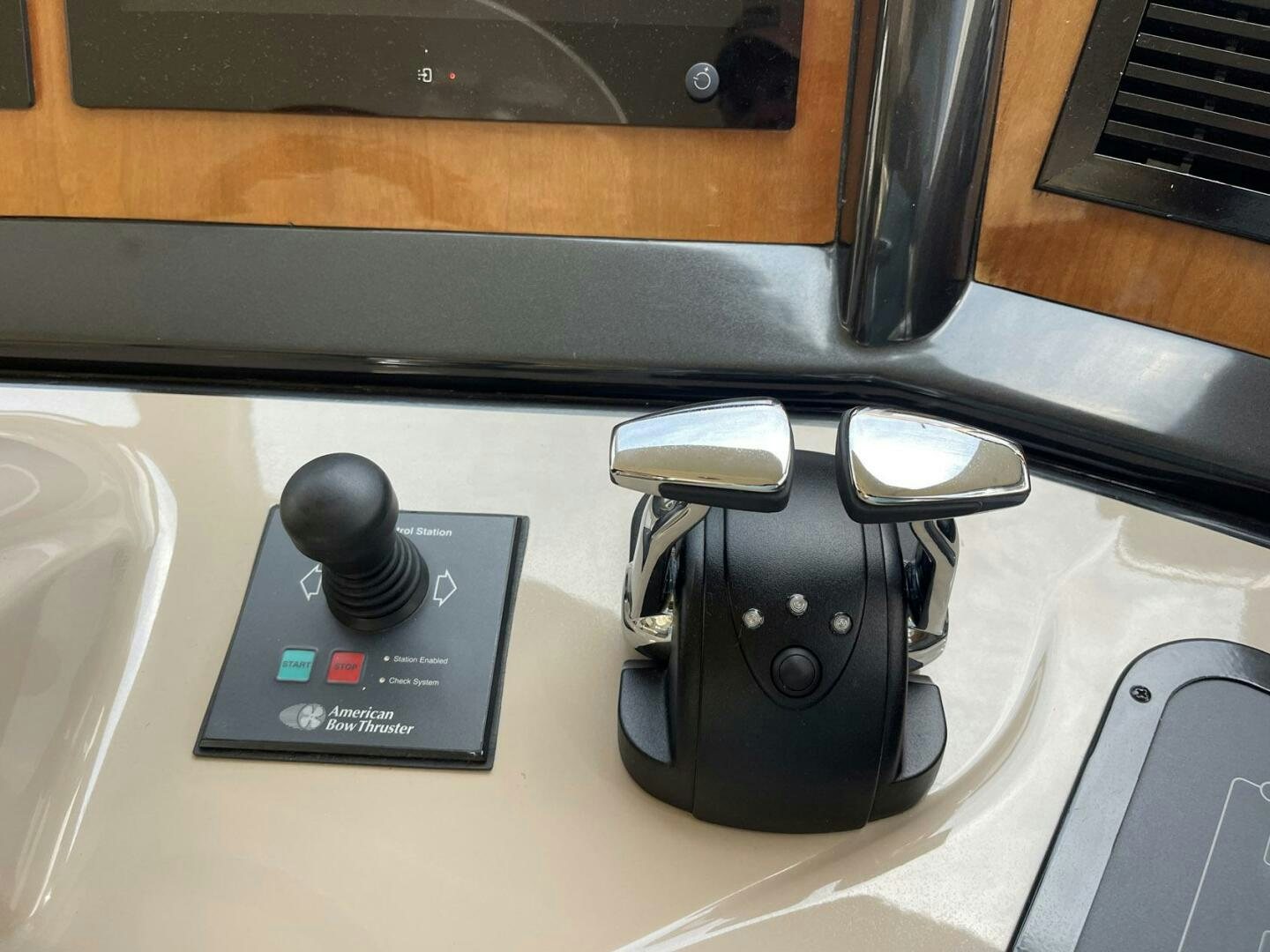 a black steering wheel on a white car aboard FAIRYTALE Yacht for Sale