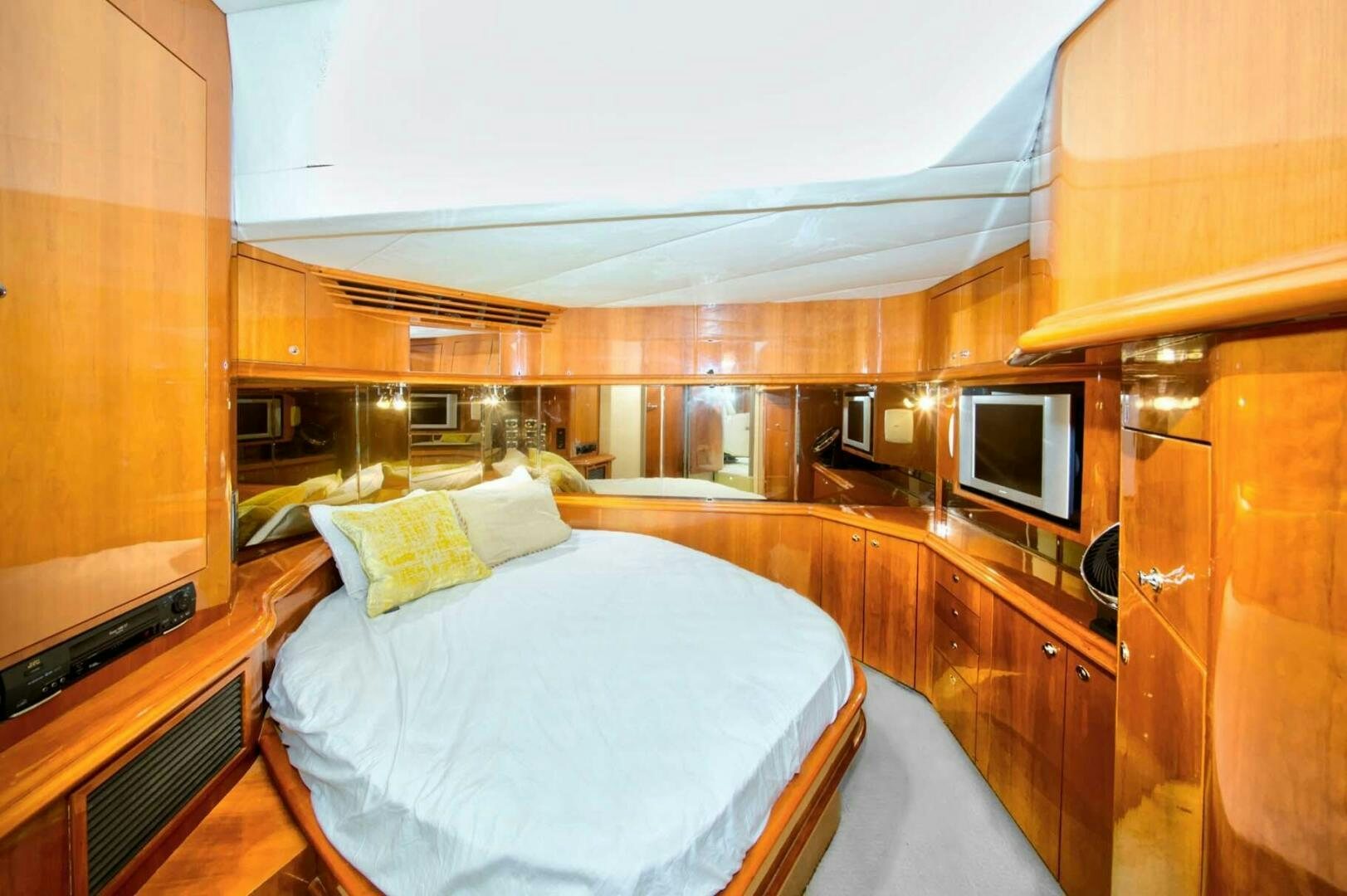 a room with wooden cabinets aboard FAIRYTALE Yacht for Sale
