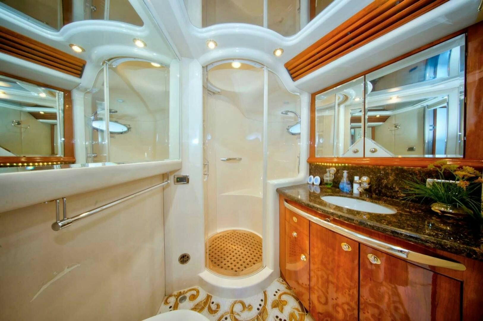 a bathroom with a marble countertop aboard FAIRYTALE Yacht for Sale