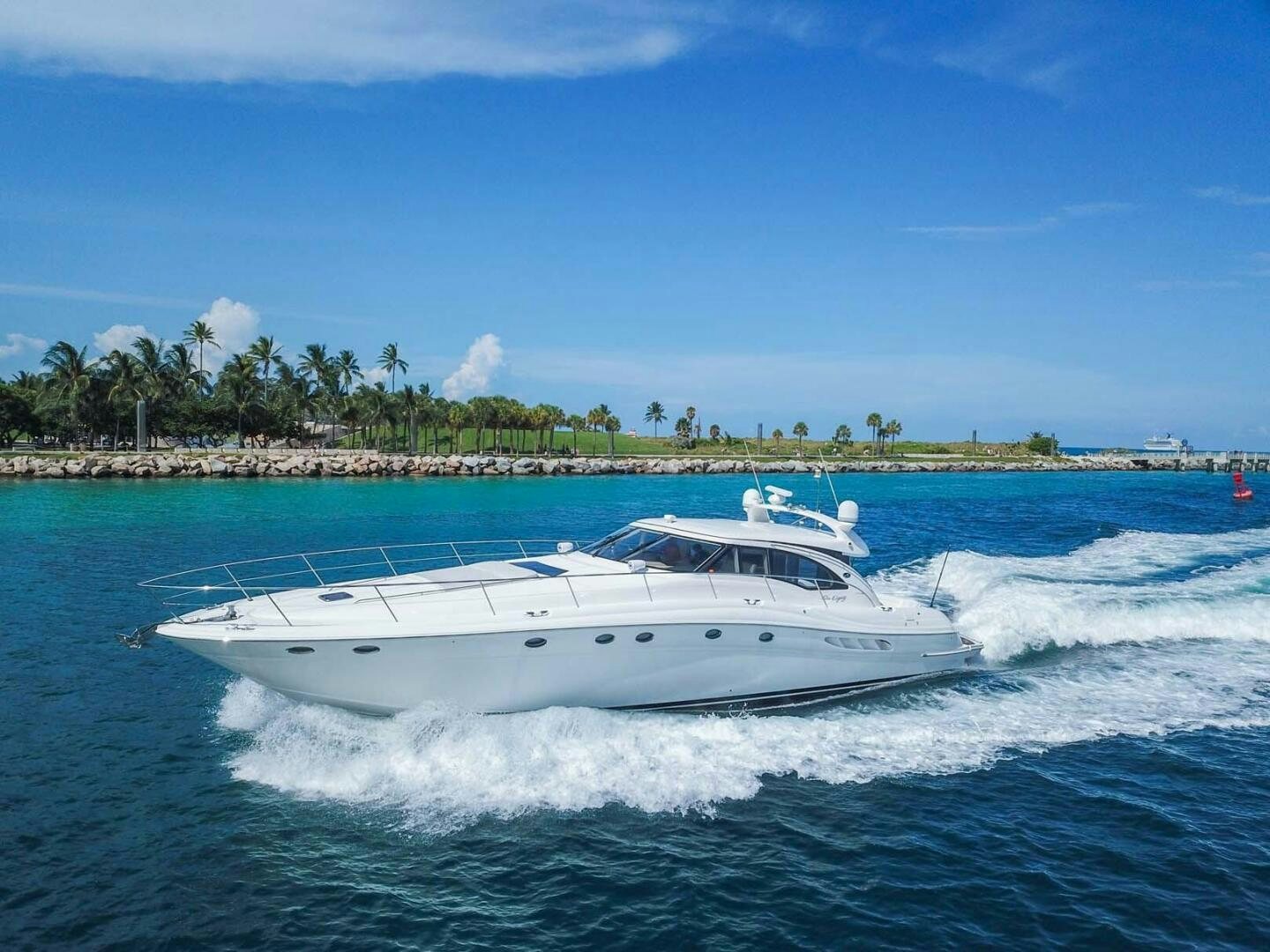 a white boat on the water aboard FAIRYTALE Yacht for Sale