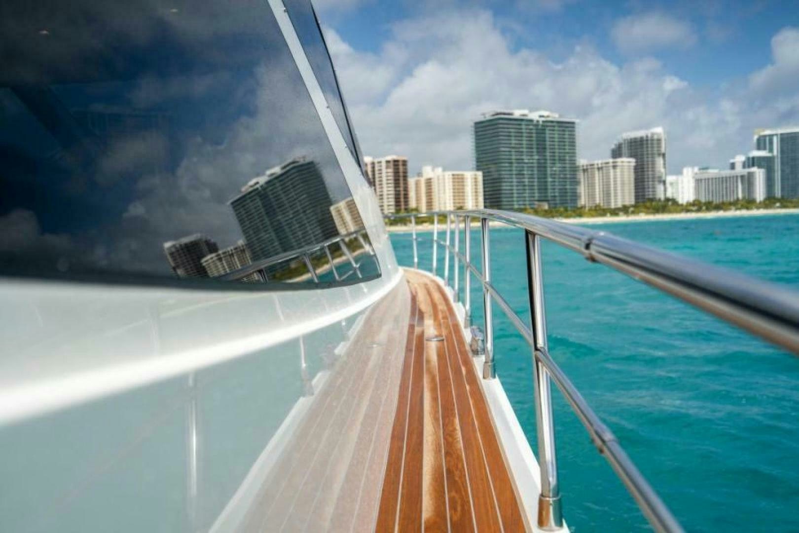 a bridge over water with buildings in the background aboard EQUINOX Yacht for Sale