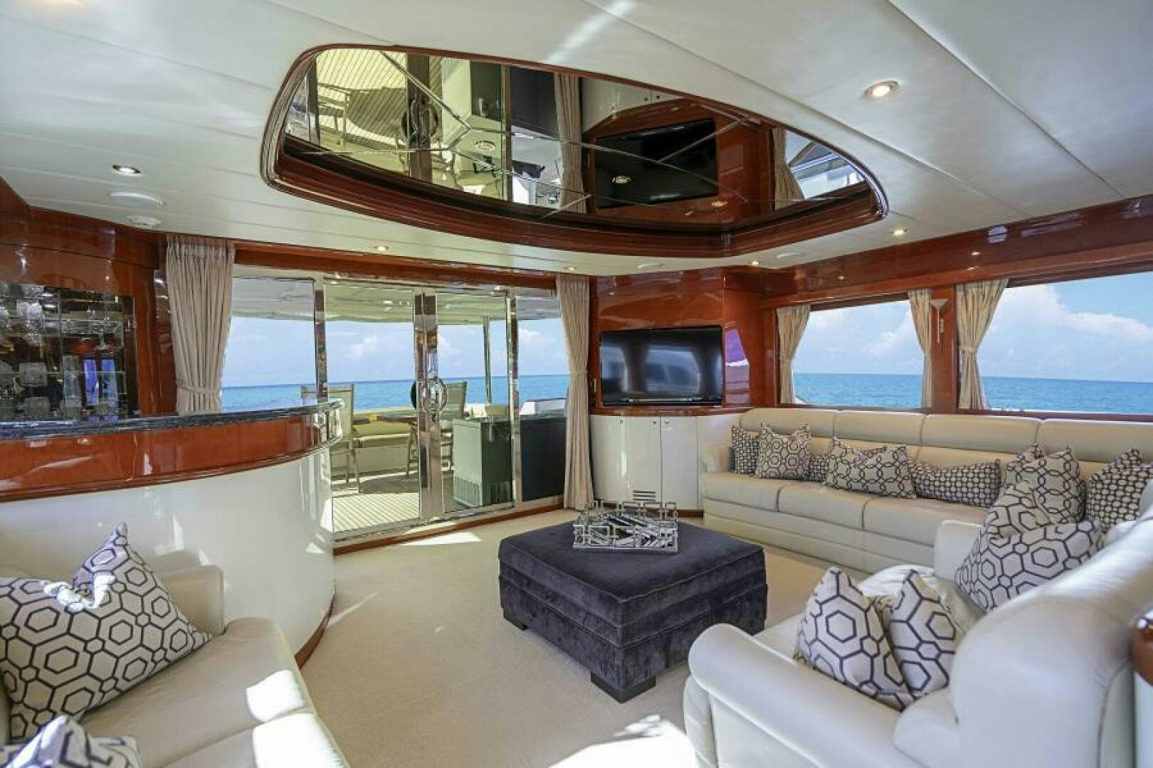 a living room with a large window aboard SIXTY SIX Yacht for Sale