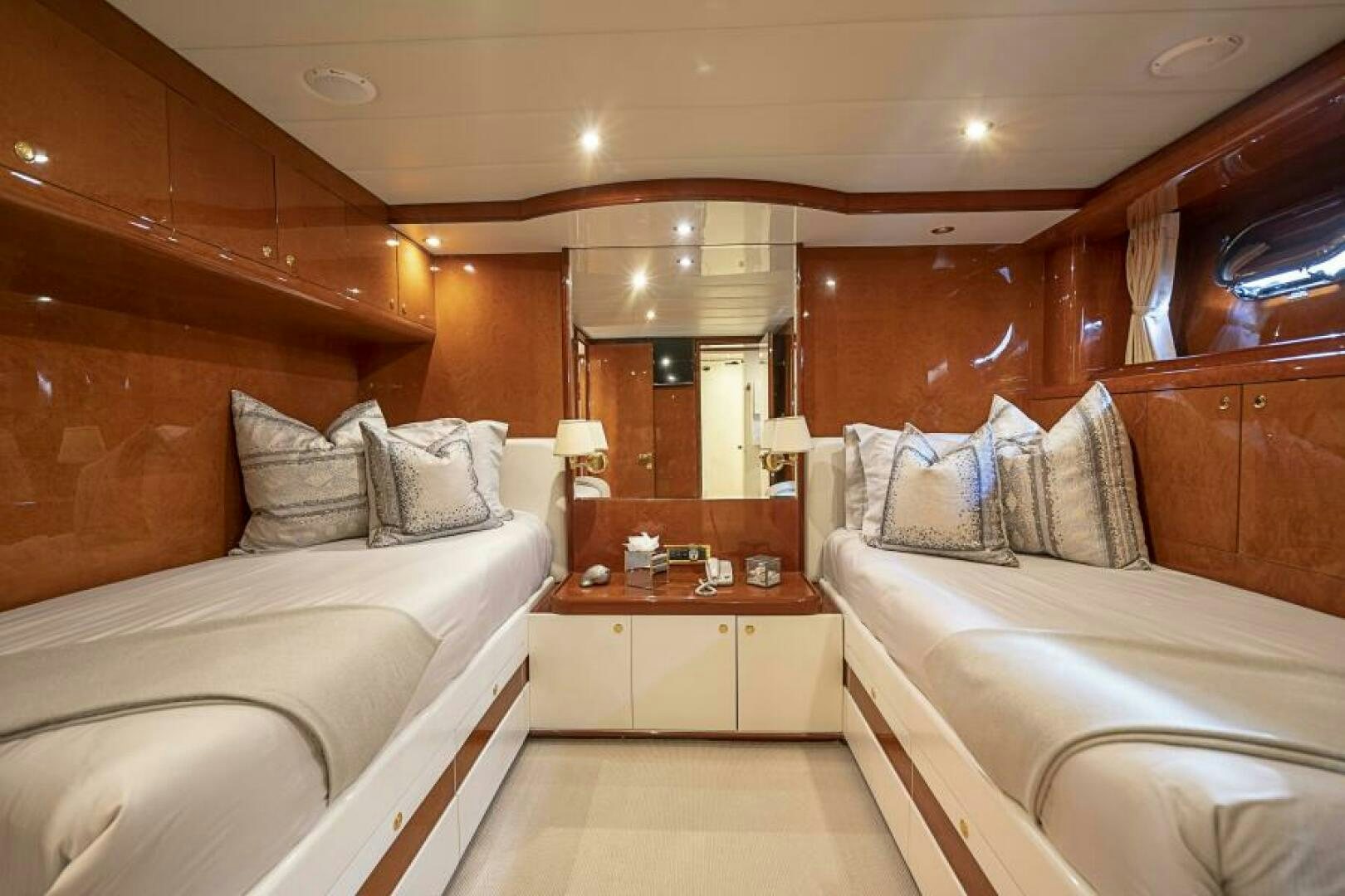 a room with two beds aboard SIXTY SIX Yacht for Sale