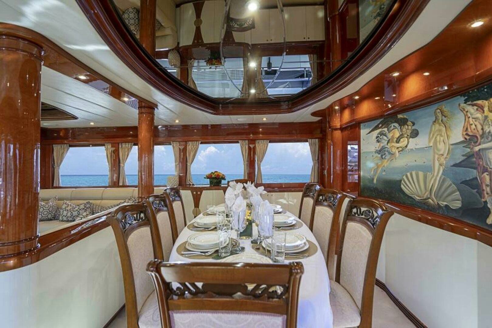 a dining table set for a dinner aboard SIXTY SIX Yacht for Sale