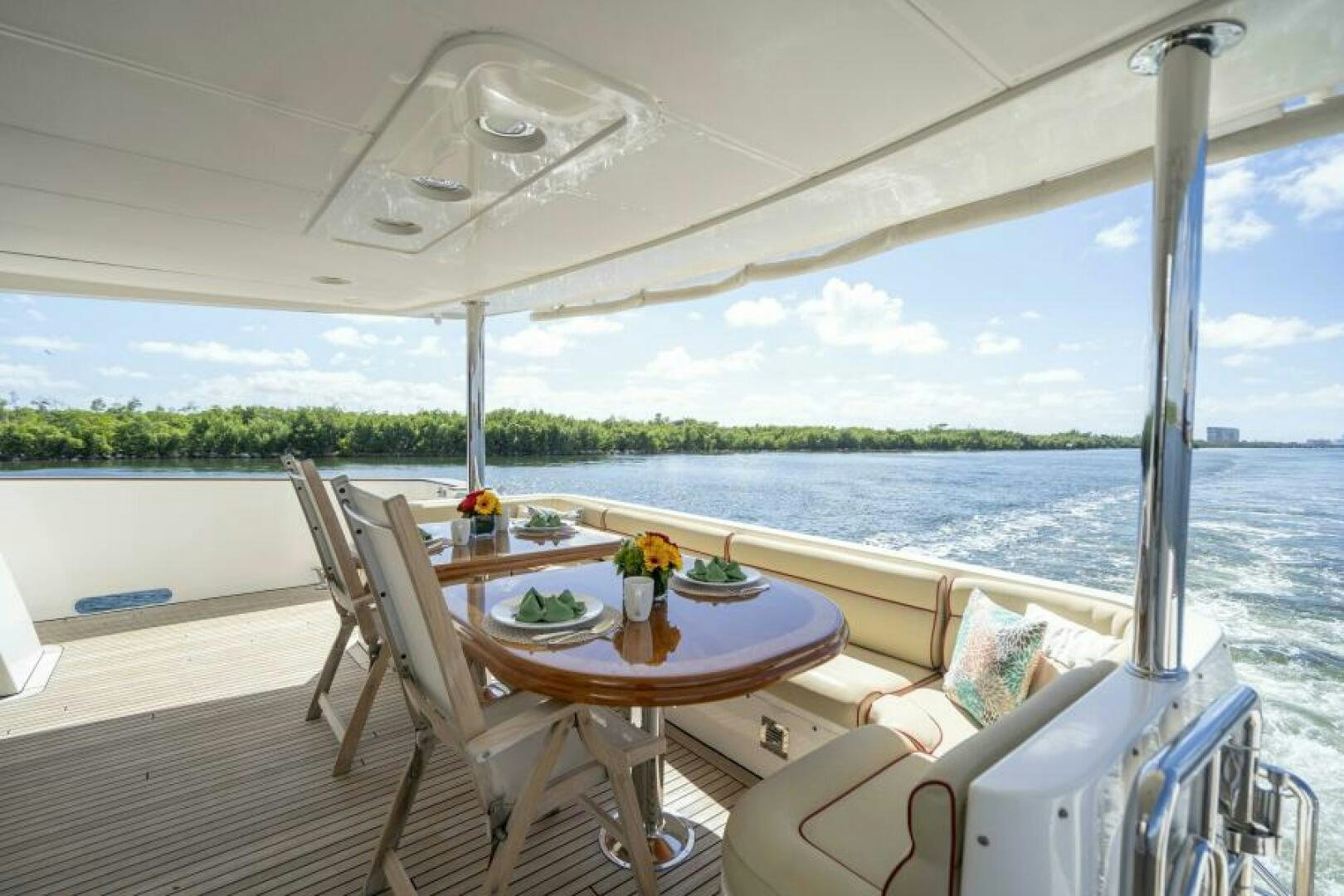 a table on a boat aboard SIXTY SIX Yacht for Sale