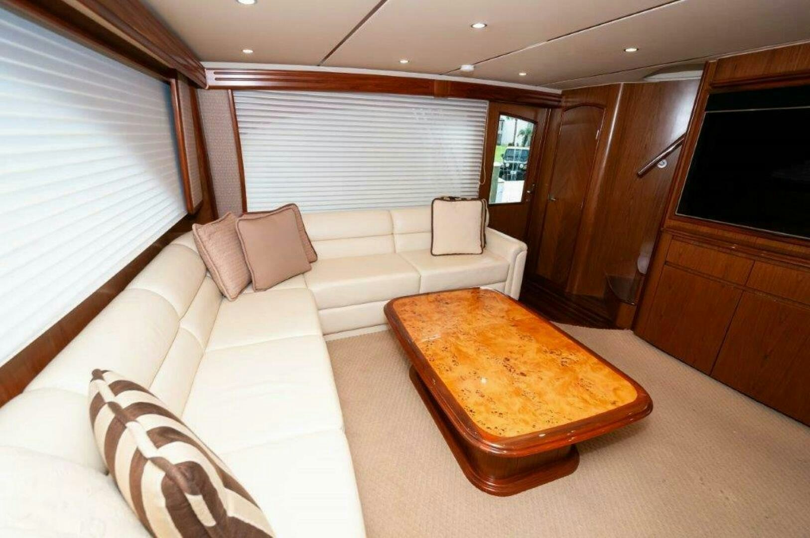 a room with a bed and a couch aboard BAREFOOT DRIVE Yacht for Sale